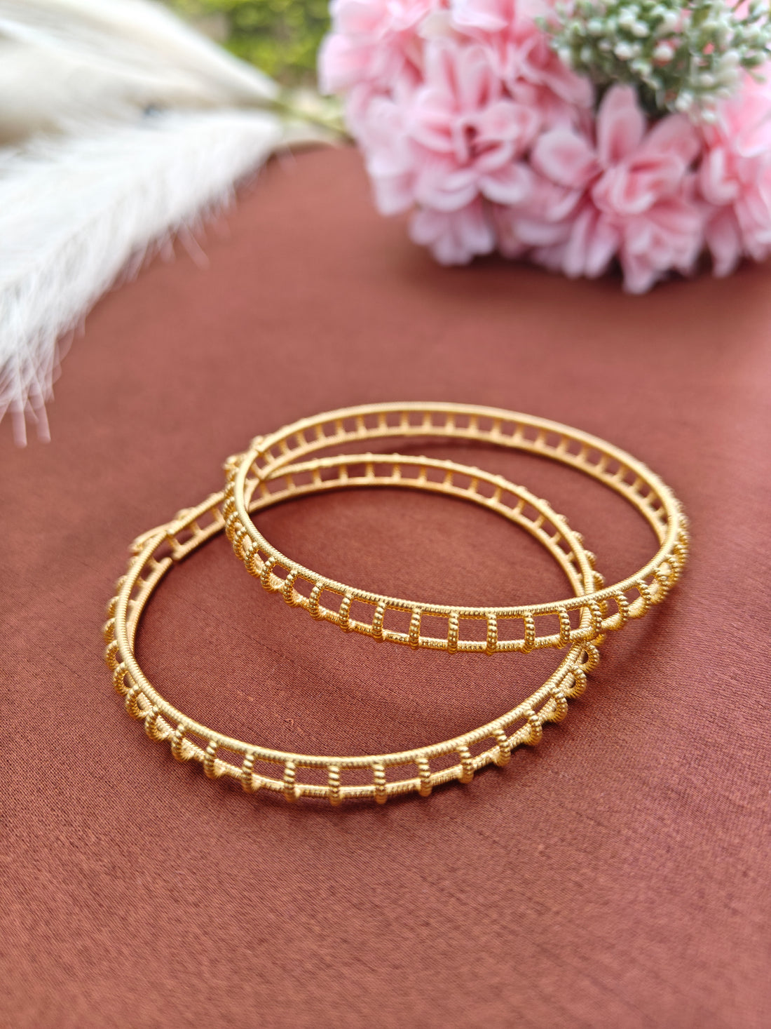 Glass bangle wrap over essential
